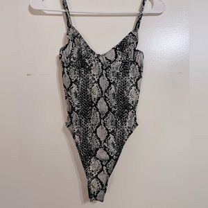 Fashion Nova Snake Skin Body Suite. Worn once!